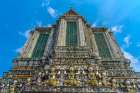 Colorful ceramic guardians, central prang, Wat Arun, Buddhist Temple of Dawn, Bangkok, Thailand. Art Print
